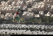 Iranian Military Commandoes Parachute from Milad Tower
