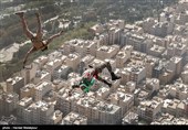 Iranian Military Commandoes Parachute from Milad Tower