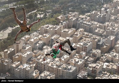 Iranian Military Commandoes Parachute from Milad Tower