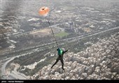 Iranian Military Commandoes Parachute from Milad Tower