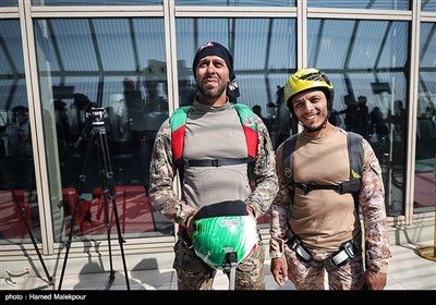 Iranian Military Commandoes Parachute from Milad Tower