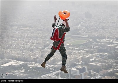 Iranian Military Commandoes Parachute from Milad Tower