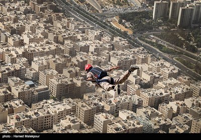 Iranian Military Commandoes Parachute from Milad Tower