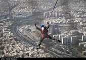 Iranian Military Commandoes Parachute from Milad Tower