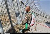 Iranian Military Commandoes Parachute from Milad Tower