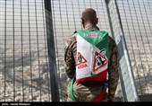 Iranian Military Commandoes Parachute from Milad Tower