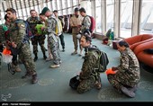Iranian Military Commandoes Parachute from Milad Tower