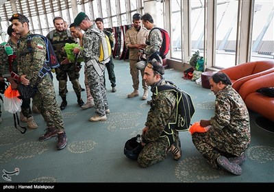 Iranian Military Commandoes Parachute from Milad Tower