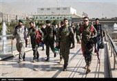 Iranian Military Commandoes Parachute from Milad Tower