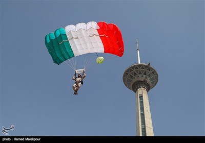 Iranian Military Commandoes Parachute from Milad Tower