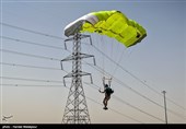 Iranian Military Commandoes Parachute from Milad Tower