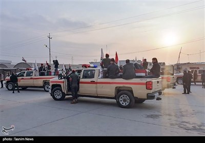 انتقال شهدای عملیات تروریستی امریکا به محل برگزاری تشییع در عراق