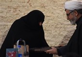 همسر شهید تهرانی مقدم در قم مورد تقدیر قرار گرفت