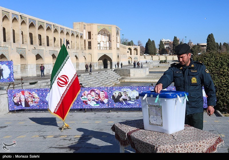 A police officer cast his vote in Isfahan