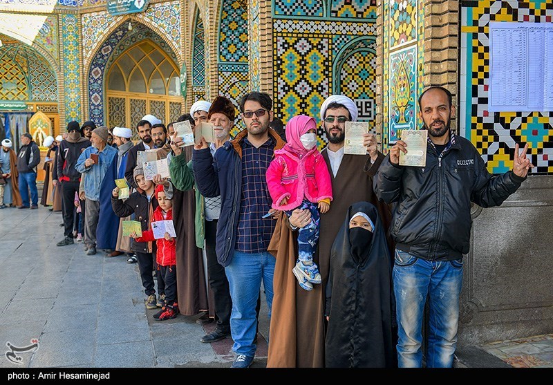 A line of voters posed for a picture in Qom