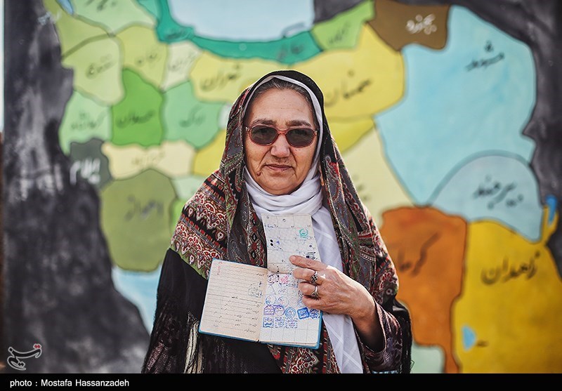 A woman prepared to vote in Golestan Province