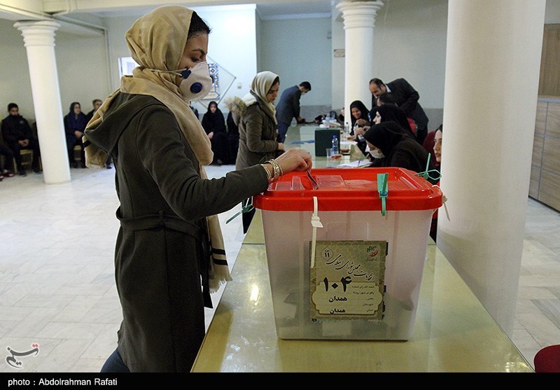 A woman in Hamedan wears a mask amidst a coronavirus outbreak