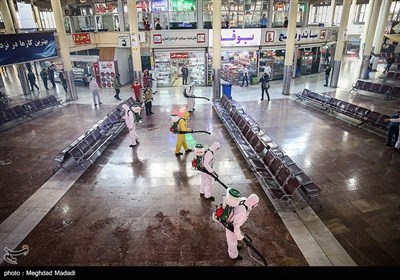 Iranian Firefighters Disinfect Tehran’s Main Bus Hub 