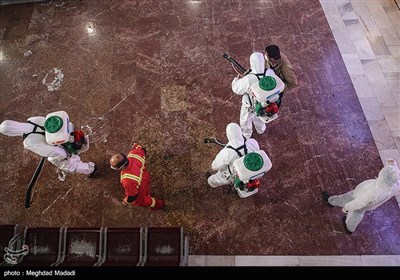 Iranian Firefighters Disinfect Tehran’s Main Bus Hub 