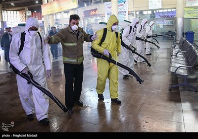 Iranian Firefighters Disinfect Tehran’s Main Bus Hub 