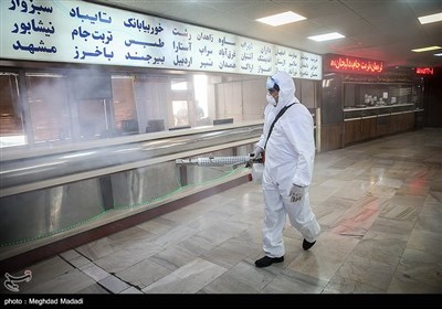 Iranian Firefighters Disinfect Tehran’s Main Bus Hub 