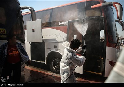 Iranian Firefighters Disinfect Tehran’s Main Bus Hub 