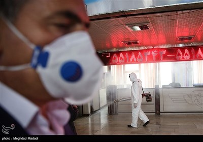 Iranian Firefighters Disinfect Tehran’s Main Bus Hub 