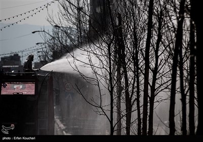عملیات ضدعفونی خیابان ولیعصر (عج) توسط آتش نشانان