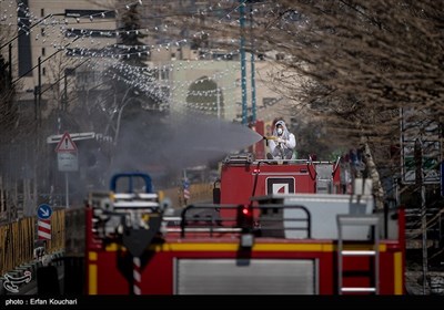 عملیات ضدعفونی خیابان ولیعصر (عج) توسط آتش نشانان