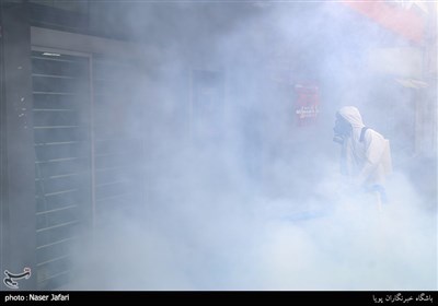 Iranian Firemen Sanitize Neighborhood in Western Tehran