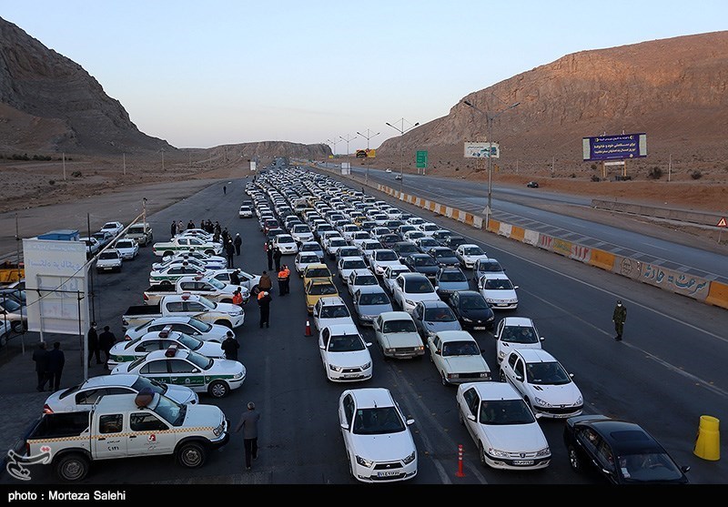 Cars stopped for screening near Isfahan on March 20.