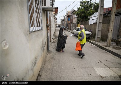 پاكسازی و ضدعفونی محلات و توزيع ماسك رايگان درب منازل در محلات حاشیه نشین شهرستان گرگان توسط خادمین موکب علی بن موسی الرضا(ع) استان گلستان