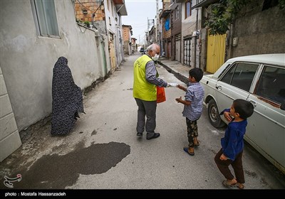 پاكسازی و ضدعفونی محلات و توزيع ماسك رايگان درب منازل در محلات حاشیه نشین شهرستان گرگان توسط خادمین موکب علی بن موسی الرضا(ع) استان گلستان