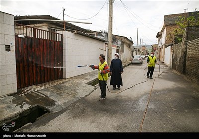 پاكسازی و ضدعفونی محلات و توزيع ماسك رايگان درب منازل در محلات حاشیه نشین شهرستان گرگان توسط خادمین موکب علی بن موسی الرضا(ع) استان گلستان