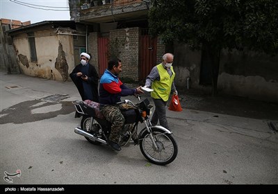 پاكسازی و ضدعفونی محلات و توزيع ماسك رايگان درب منازل در محلات حاشیه نشین شهرستان گرگان توسط خادمین موکب علی بن موسی الرضا(ع) استان گلستان