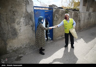 پاكسازی و ضدعفونی محلات و توزيع ماسك رايگان درب منازل در محلات حاشیه نشین شهرستان گرگان توسط خادمین موکب علی بن موسی الرضا(ع) استان گلستان