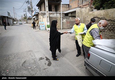 پاكسازی و ضدعفونی محلات و توزيع ماسك رايگان درب منازل در محلات حاشیه نشین شهرستان گرگان توسط خادمین موکب علی بن موسی الرضا(ع) استان گلستان