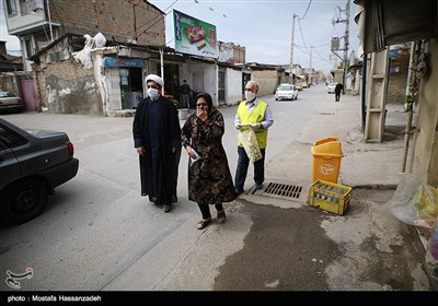 پاكسازی و ضدعفونی محلات و توزيع ماسك رايگان درب منازل در محلات حاشیه نشین شهرستان گرگان توسط خادمین موکب علی بن موسی الرضا(ع) استان گلستان