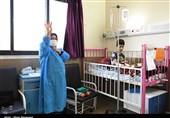 عیادت جوانان حشدالشعبی عراق از بیماران در قم به روایت تصویر