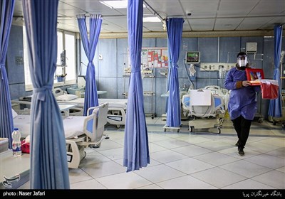 پرچم مطهر بارگاه امام حسین(ع) در بیمارستان فجر