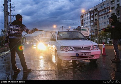  ضدعفونی کردن خودروها توسط بسیجیان