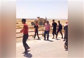 Syrian Kids Pelt US Military Convoy in Hasakah after Army Stops Vehicles (+Video)