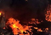 تداوم آتش سوزی 50 انبار مواد غذایی در نجف+عکس