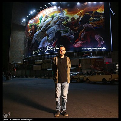 حسن روح‌‌الامین در تعویض دیوارنگاره میدان ولیعصر(عج) تهران