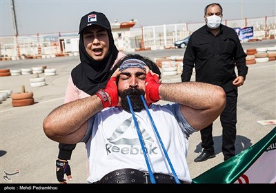 ثبت رکورد جهانی جابجایی کامیون با دندان توسط پوریا و فائزه سرلک-اهواز