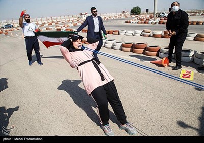 ثبت رکورد جهانی جابجایی کامیون با دندان توسط پوریا و فائزه سرلک-اهواز