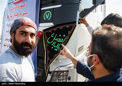 ثبت رکورد جهانی جابجایی کامیون با دندان توسط پوریا و فائزه سرلک-اهواز
