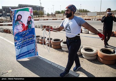 ثبت رکورد جهانی جابجایی کامیون با دندان توسط پوریا و فائزه سرلک-اهواز