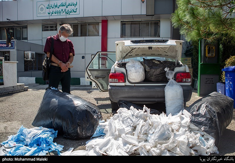 کشف 100 هزار ماسک غیربهداشتی در پایانه غرب تهران + تصاویر