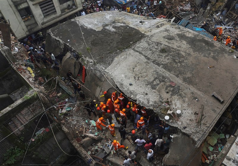 Ten Dead, Up to 25 Feared Trapped in India Building Collapse